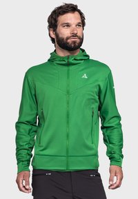 Grüne Zip-Hoodiejacke aus strukturiertem Stoff, athletischer Schnitt, zwei seitliche Zippockets und weißes Logo auf der Brust.