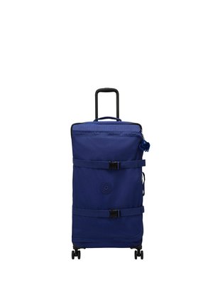 Grande valise souple bleue avec deux sangles noires à boucle, quatre roulettes et une poignée télescopique déployée.