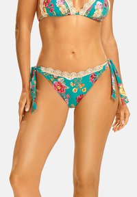 Bikini w kolorze turkusowym z floralnym wzorem, koronkowym wykończeniem i regulowanymi bokami do zawiązania. Miękka tkanina o gładkiej fakturze.