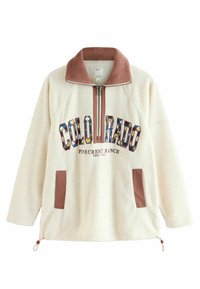 Fleece pullover in crÃ¨me met een ritssluitkraag, voorzien van een meerkleurige "COLORADO" grafiek en bruine accenten op de zakken en kraag.