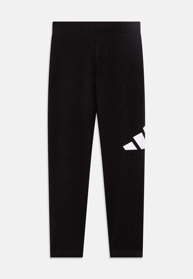 Leggings noirs en matériau doux avec un design ajusté, arborant un logo blanc imprimé sur le bas à gauche.