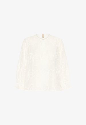 Blouse blanche avec broderie florale, encolure ronde, longues manches bouffantes avec poignets froncés, et ouverture en forme de clé à l'avant.