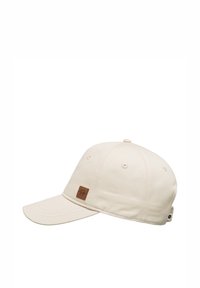 Gorra de algodón beige con corona redondeada, visera curva, ojales en los lados y un parche de cuero marrón con el logo en la parte frontal.