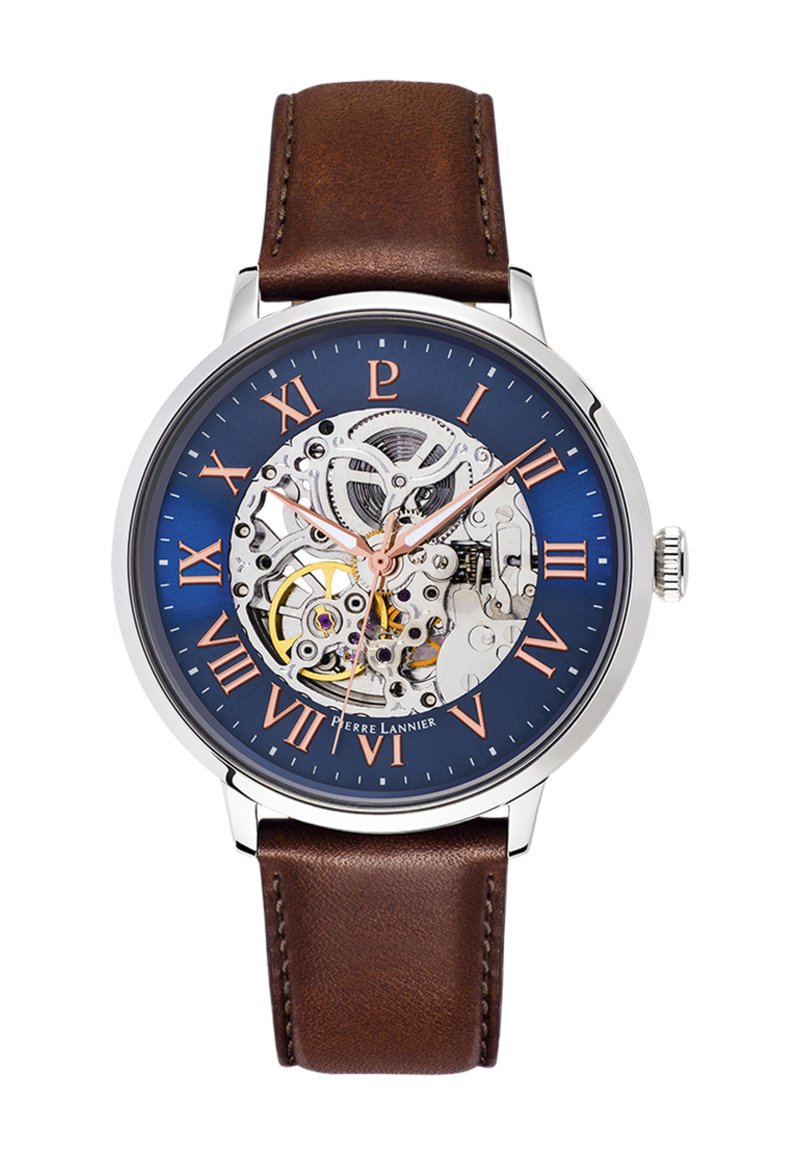 Montre mécanique avec un cadran bleu, boîtier transparent montrant les rouages, accents en or rose, marques horaires en bronze et un bracelet en cuir brun.