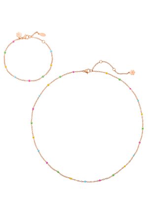 Delicate rose gold chain necklace and bracelet with evenly spaced small round beads in pink, blue, green, and yellow colors.