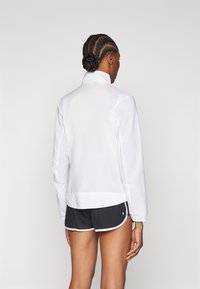 adidas Performance ADIZERO ESSENTIALS - Løbejakker - white