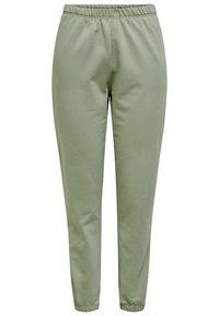 Ljusgröna sweatpants med elastisk midja, avsmalnande ben och fållade nederkanter, gjorda av mjukt, texturerat tyg. Passar för avslappnad användning.