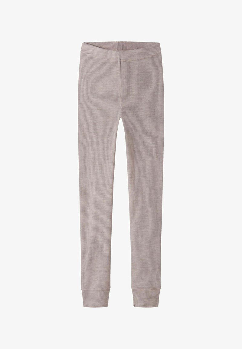 Leggings beige clair avec une texture côtelée, dotés d'une ceinture ajustée et de poignets serrés aux chevilles. Confectionnés dans un matériau doux et extensible.