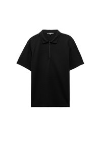Polo shirt nera in un tessuto a maglia testurizzato, con colletto e zip sul collo, maniche corte e vestibilità rilassata.