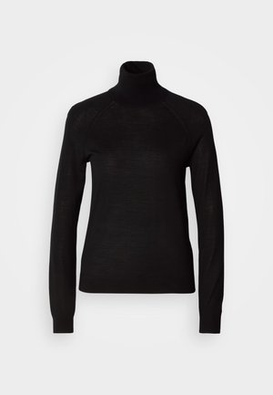 Melna augsta apkakle adīta džemperis, kas izgatavots no viegla austā auduma. Tam ir garas piedurknes un pieguļoša silueta ar raglāna šuvēm.