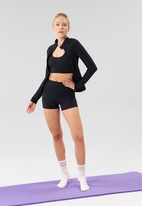 Even&Odd active ESSENTIAL MID RISE BOOTY SHORTS - Legingi - black