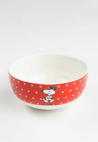 Red ceramic bowl with white polka dots and a cartoon character printed on the side, featuring a glossy finish and smooth interior.