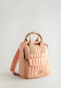 Padded peach backpack with two beige handles, adjustable straps, a front pocket, and a sun embroidery detail.