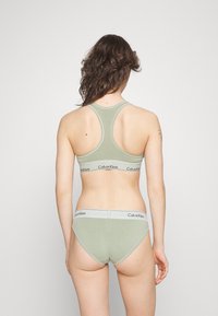 Calvin Klein Underwear UNLINED BRALETTE - Formujúca podprsenka - eco green