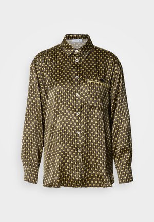 Srajca s gumbi, narejena iz sijoče tkanine, z geometričnim vzorcem v črni in zlati barvi, z žepom na prsih in dolgimi rokavi.