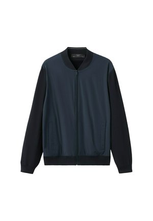 Granatowa kurtka bomberka z czarnymi rękawami, zapinana z przodu na zamek, z prążkowanym kołnierzem, mankietami i paskiem, oraz dwoma przednimi kieszeniami.