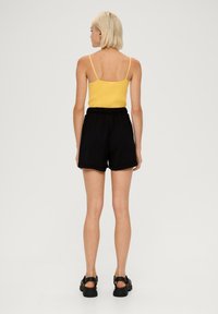 QS REGULAR AUS SEERSUCKER - Trainingsbroek - schwarz