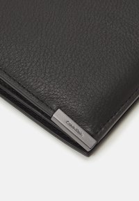 Calvin Klein MODERN PLAQUE TRIFOLD UNISEX - Wallet - black