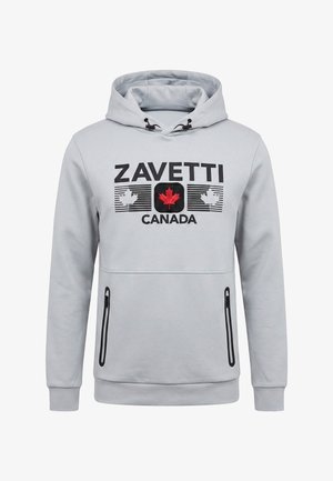 Sweat à capuche gris clair avec fermetures éclair noires sur les poches, texte noir "ZAVETTI CANADA" et emblème de feuille d'érable rouge sur la poitrine.