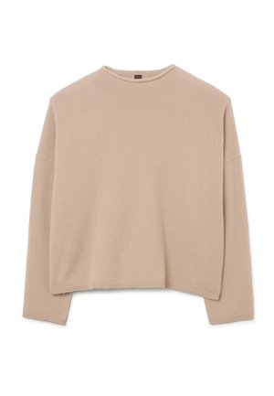 Maglione beige oversize realizzato in morbido tessuto a maglia. Caratterizzato da un collo rotondo e spalle scese con polsini e orlo a coste.