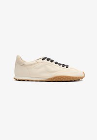 Sélectionné, off white