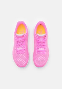 Pink athletic shoes with a breathable mesh upper, lace closure, and a padded collar. Features a yellow insole with "FRESH FOAM" text.