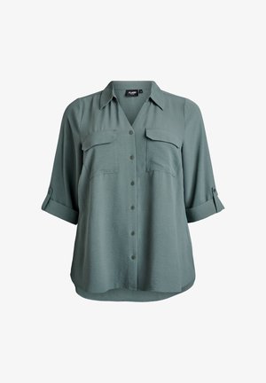 Kurzärmeliges Hemd mit Knopfleiste in gedämpftem Grün. Verfügt über zwei Brusttaschen, einen Kragen und einen leicht geschwungenen Saum. Weicher, leichter Stoff.