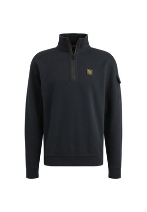 Navy zip-up sweatshirt featuring a high collar, ribbed cuffs, and a small gold logo patch on the chest. Smooth fabric texture.