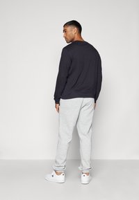 Champion ICONS ELASTIC CUFF SMALL LOGO - Jogginghose - grey