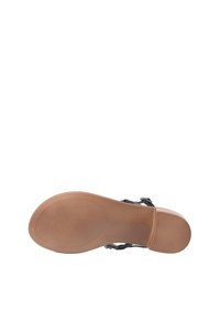 Sandalo nero con suola piatta, suola in gomma testurizzata e design decorativo della cinghia. Soletta marrone chiaro; dettagli di accentuazione minimi.