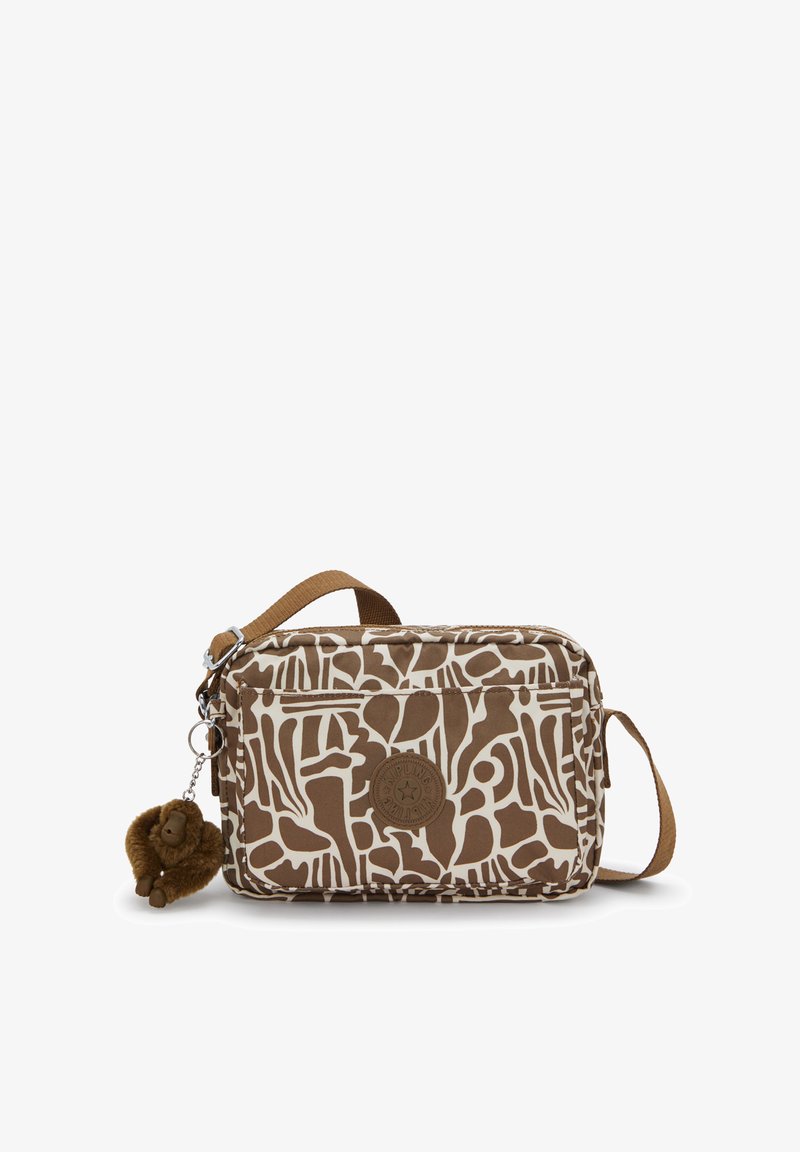 Braune und cremefarbene Umhängetasche mit Muster, abnehmbarem Affenanhänger, Stoffmaterial, rechteckiger Form, Reißverschluss und verstellbarem Riemen.