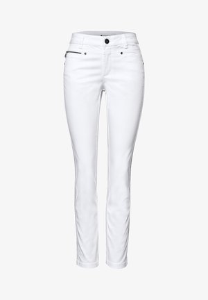 Pantalon blanc slim pour femmes avec bouton à l'avant, fermeture éclair et petite poche zippée sur le côté gauche des hanches.