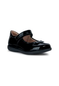 Zapato Mary Jane de charol negro con punta redonda, borde con ondas y tira ajustable. Presenta un sutil detalle de lazo en la parte frontal.