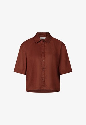 Short-sleeve button-up shirt in rust-colored fabric, featuring a pointed collar and a straight hem with a textured, slightly shiny finish.