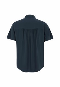 Kortærmet skjorte i mørk navy stof med krave og plisseret rygdesign. Glat tekstur med en løs pasform.