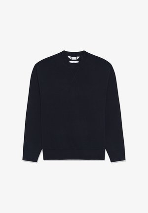 Marineblå sweatshirt med lange ærmer, rund halsudskæring og ribbede manchetter. Har et tekstureret strikket stof og X-syning detalje på halsen.