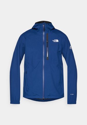 Blå vandtæt jakke med lange ærmer, justerbar hætte, frontlynlås, brystlomme og elastiske manchetter. Har "The North Face" logo.
