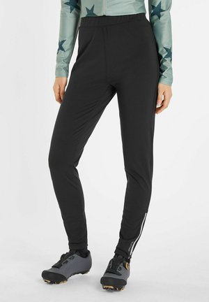Schwarze Sporthose mit schmaler Passform, elastischem Bund und seitlichem Reißverschlussdetails, aus dehnbarem Material für Komfort und Beweglichkeit.