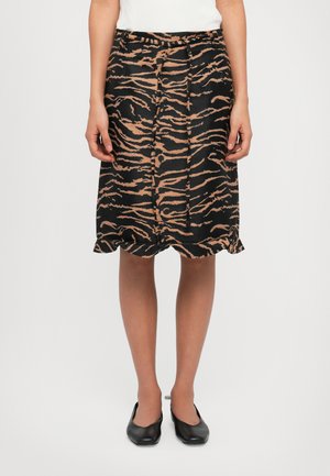 Jupe à rayures zèbres noire et beige avec un ourlet évasé, en tissu lisse, dotée d'une taille ajustée et d'une coupe mi-longue.