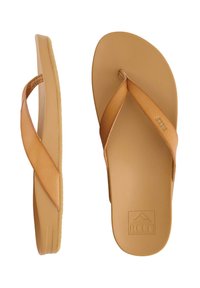 Tan flip-flops with a textured, synthetic upper and smooth rubber sole. Features crisscross straps and embossed logo on the footbed.