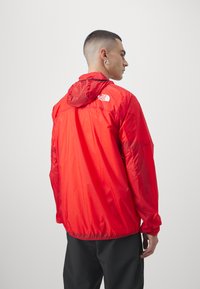 The North Face WINDSTREAM SHELL - Windbreakers - high risk red
