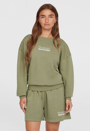 Olive green sweatshirt and matching shorts set; sweatshirt with loose fit and ribbed cuffs, features "The Future Surf Society" embroidered in white.