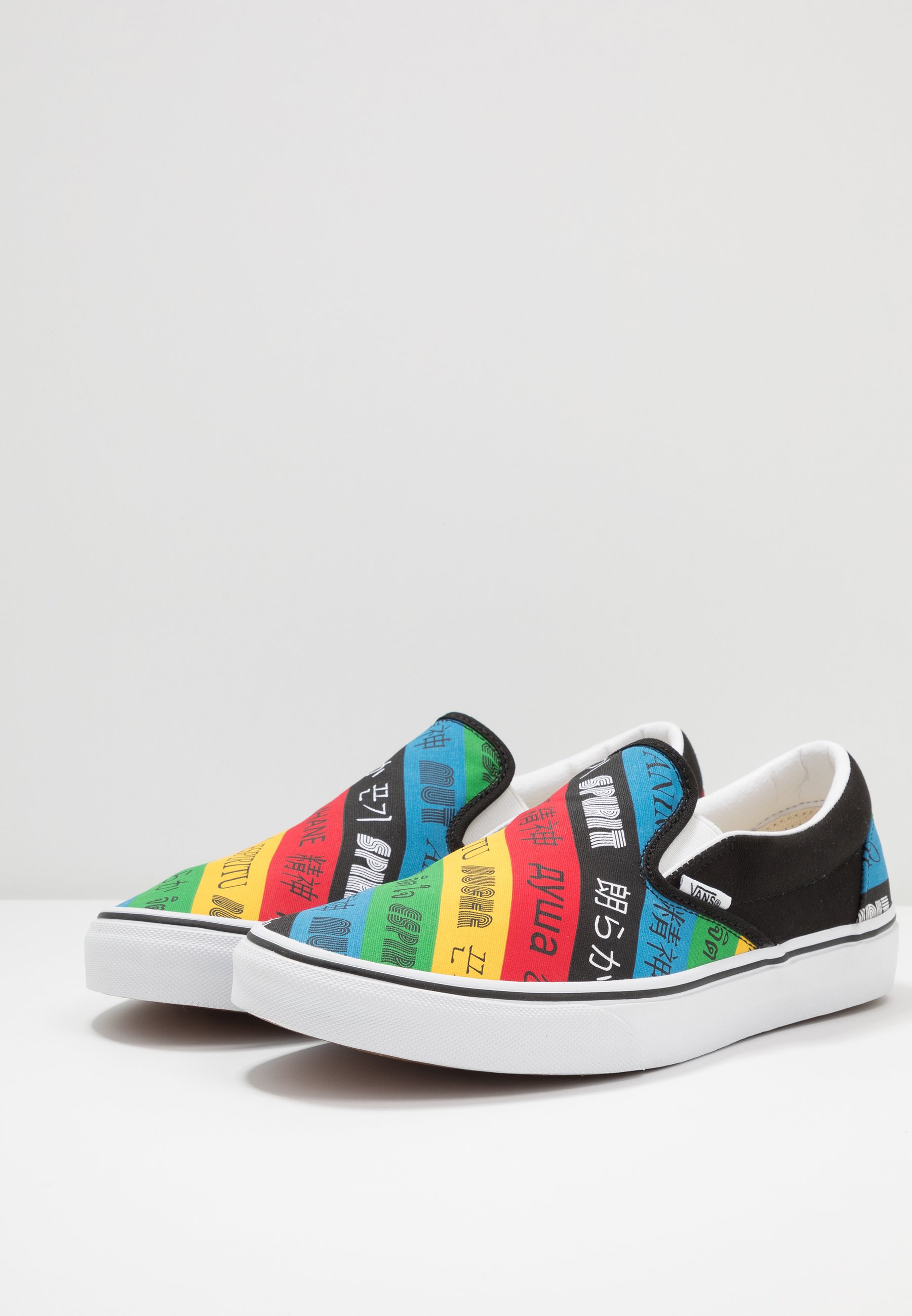 multi coloured slip on vans