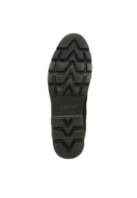 Black rubber shoe sole with a zigzag tread pattern; features a slight arch and textured surface for grip and durability. Vionic branding present.