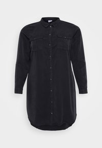 Black, long-sleeve shirt dress with a button-down front, two chest pockets, and a curved hem. Made of soft fabric with a smooth texture.