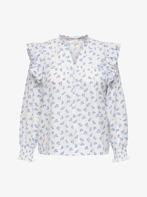 Blusa bianca a maniche lunghe con piccolo motivo floreale blu, dettagli arricciati sulle spalle, scollo a V e polsini elasticizzati con rifinitura in pizzo.