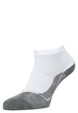 Enkelsok met een witte stoffen bovenkant die overgaat in een grijze geblokte teen, gemaakt van een zachte, rekbare mix voor comfort.