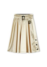 Jupe en satin doré avec une taille élastique, un cordon de serrage réglable et des boutons latéraux pour la fermeture. Présente un patch logo rond à la taille.