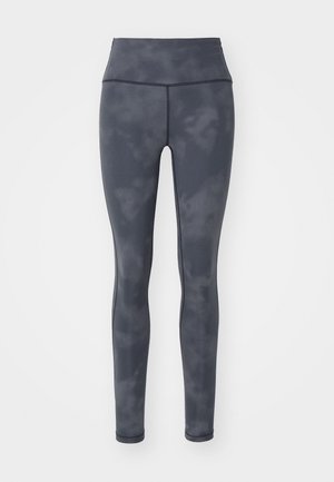 Magas derekú, szénszürke leggings, rugalmas anyagból, finom felhőmintázattal és sima textúrával, a kényelem érdekében tervezve.