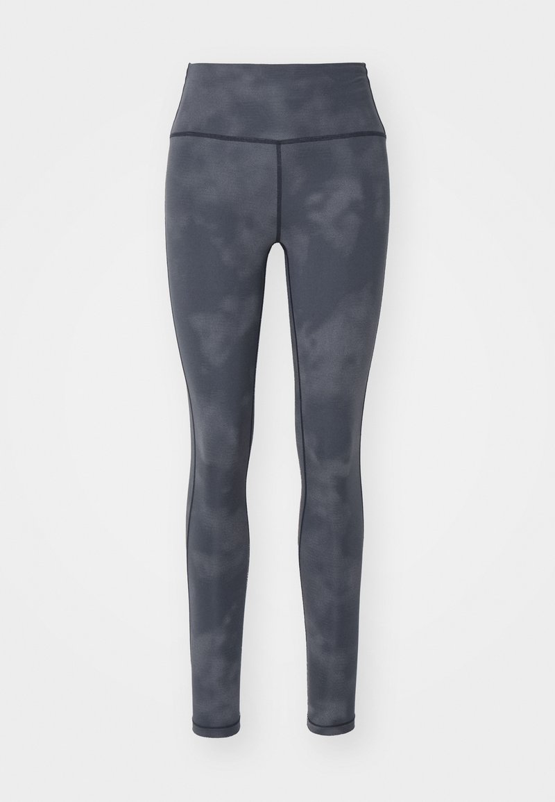 Leggings taille haute en gris charbon fabriqués dans un tissu extensible avec un motif subtil ressemblant à des nuages et une texture lisse, conçus pour le confort.